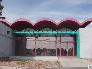 scalloped roof line of the old Federated Employees Building at  2301 E. Sahara