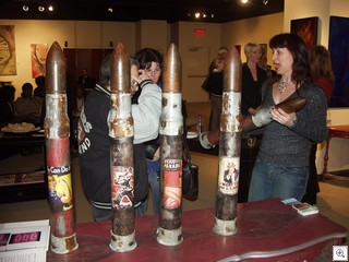 Local Artist Leslie Rowland and her WWII bomb shell war protest pieces in the Artspace/Originals Gallery