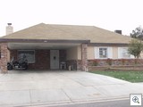 Brick facing and 2 car carport