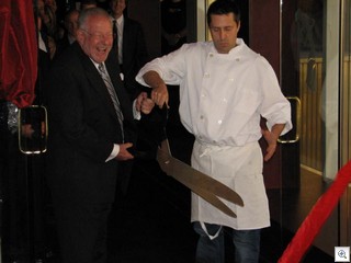 Mayor Oscar Goodman Cuts The Ribbon For FIREFLY , as owner John Simmons helps out. Firefly is the newest bar and restaurant in the Union Plaza at Main and Fremont Street